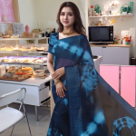 Elegant Blue Tie-Dye Georgette Saree with Tassel Detailing = Mocna