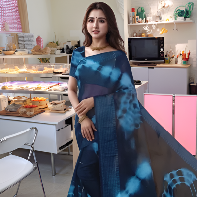 Elegant Blue Tie-Dye Georgette Saree with Tassel Detailing = Mocna